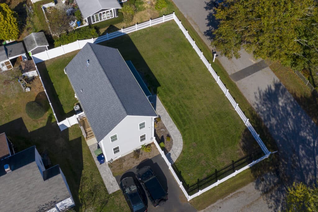 Overhead view of a fenced residential property, Rhode Island.
